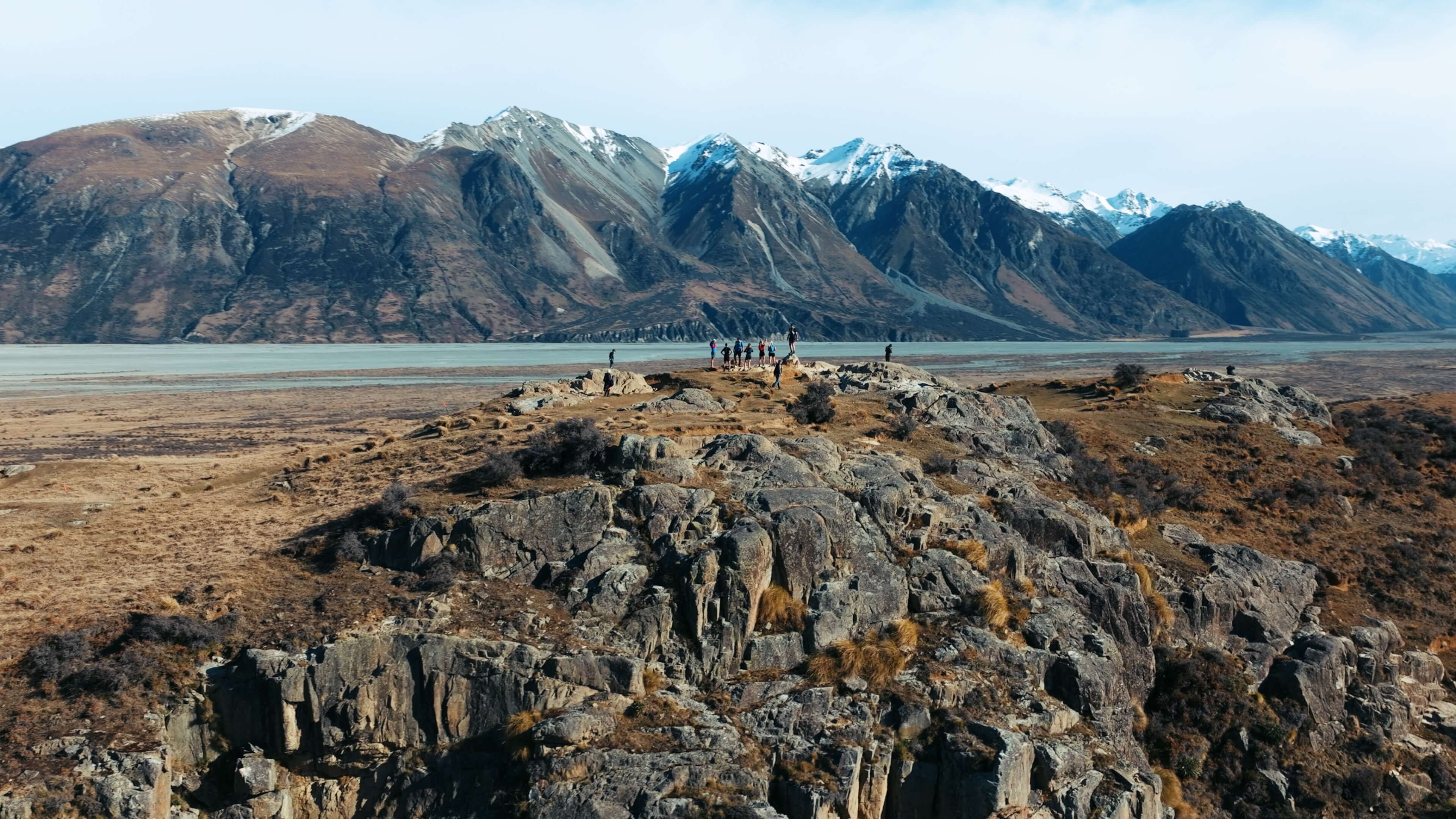 Trail runners in New Zealand mountains